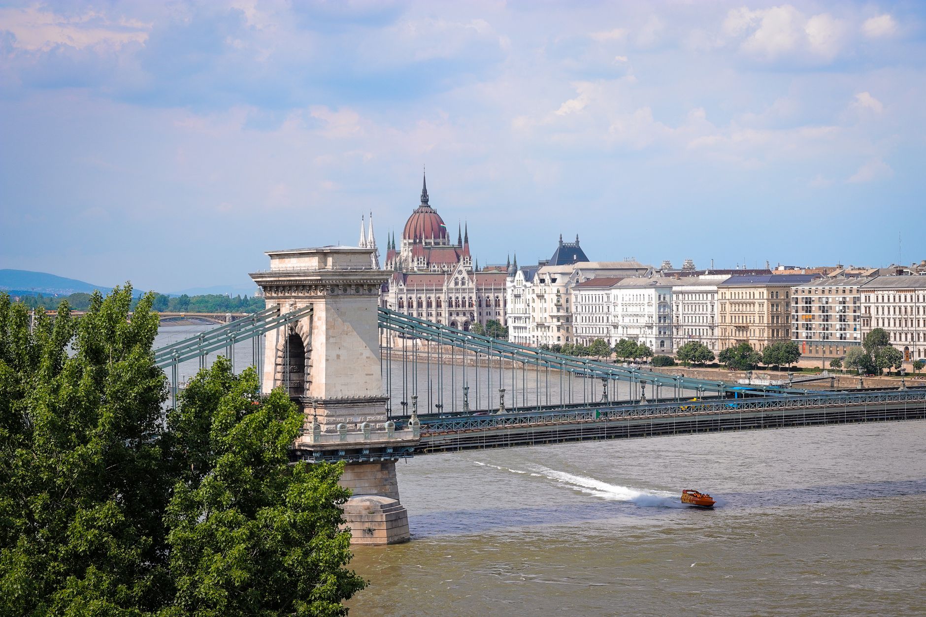The Chain Bridge over the Danube with the Hungarian Parliament behind it in Budapest