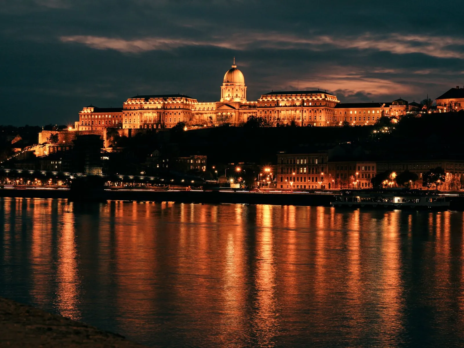 The Budapest skyline reflected in the Danube at night